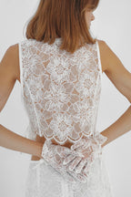 Asymmetrical lace vest