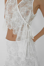 Asymmetrical lace vest